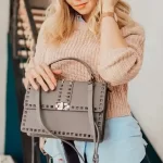 How Hermes, Gucci and Prada Bags Compare Wearing the Iconic